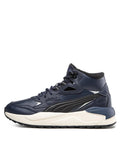 A navy blue Puma high-top sneaker with black overlays, a cream midsole, and a black outsole, shown in a side profile on a white background.